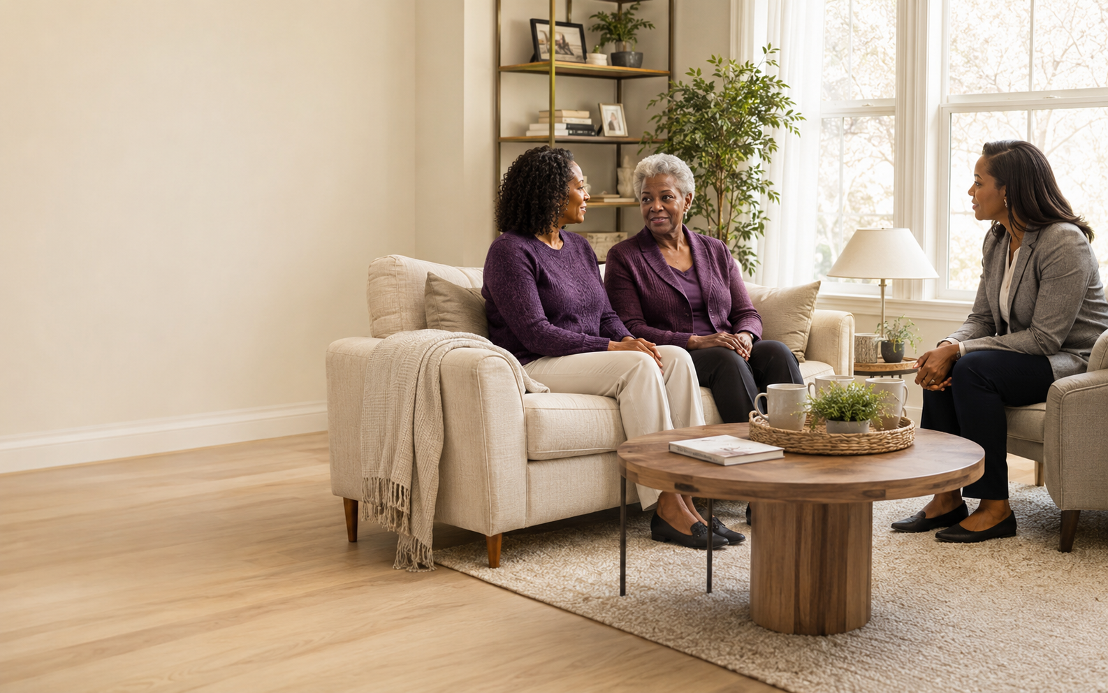 A family and a care professional discussing support at home